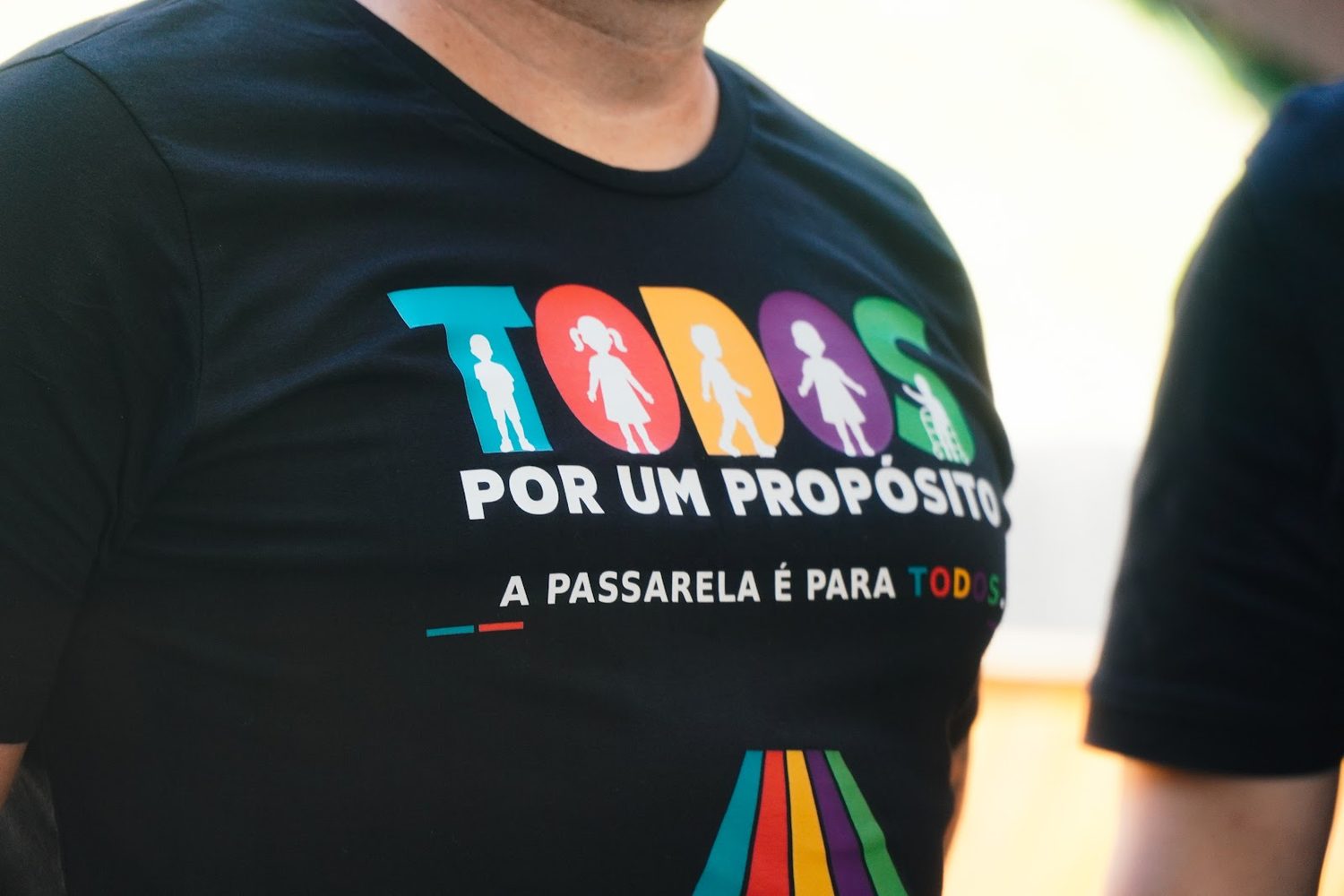 Camiseta do evento com a frase A passarela é para todos
